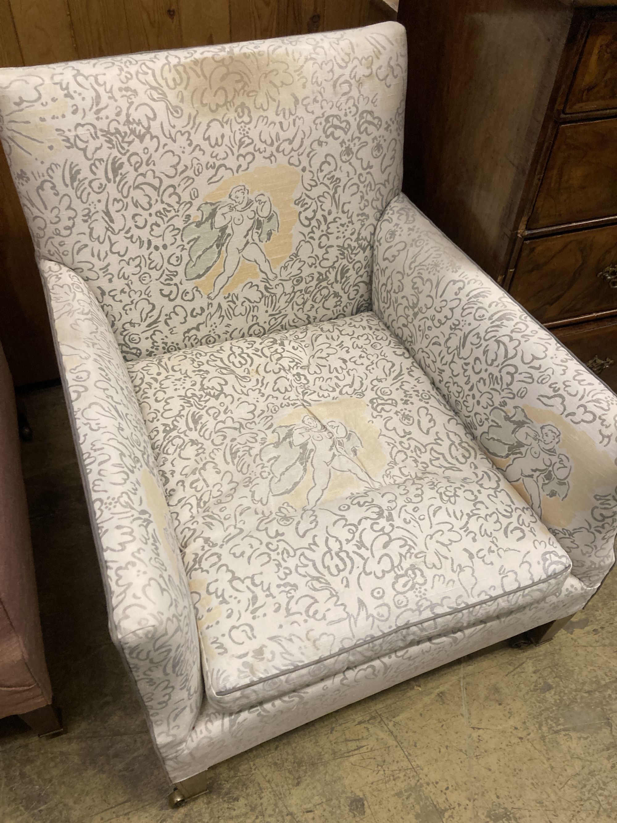 A pair of Edwardian Howard & Son upholstered square framed armchairs with stamped legs and casters, width 69cm, depth 70cm, height 78cm